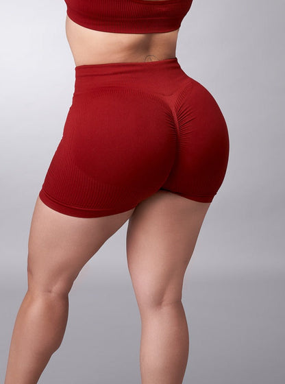 CONJUNTO AURORA: SHORT SEAMLESS PUSHUP VINO + TOP SEAMLESS VINO